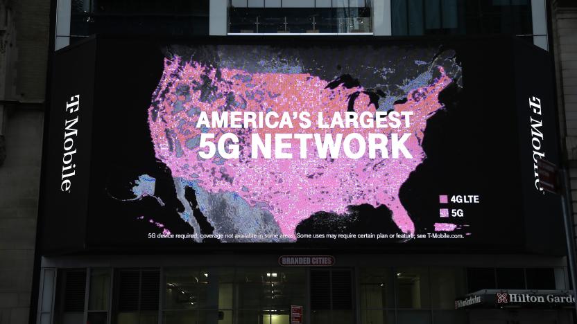 T-Mobile network advertises seen on a Jumbotron in Times...