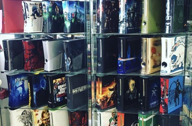 Several Xbox 360 variants being sold as part of a massive eBay video game console collection.