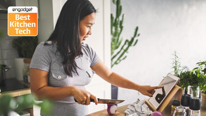 Asian women at home making healthy meal, with Engadget Best Kitchen Tech badge in top left corner. 