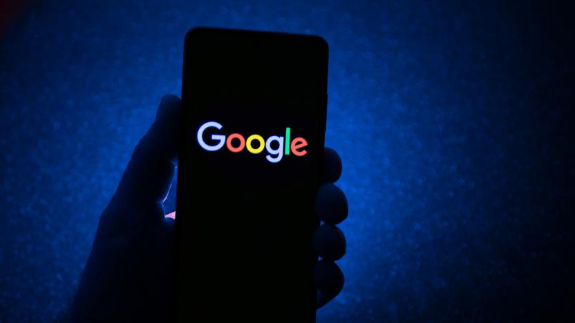 Hand is holding a smartphone with the Google logo displayed and dark blue background. Google closeup logo displayed on a phone screen, smartphone the logo or the search engine in various backgrounds like keyboard, dark illuminated texture or a computer screen,  as seen in this multiple exposure illustration, the company's symbol is globally recognized. Google, LLC is an American tech giant, a multinational technology company that specializes in Internet-related services and products, which include online advertising technologies, a search engine, cloud computing, software, and hardware. It is considered one of the Big Four - Big Tech technology companies in the U.S. and globally. Amsterdam, the Netherlands on January 10, 2022 (Photo by Nicolas Economou/NurPhoto via Getty Images)