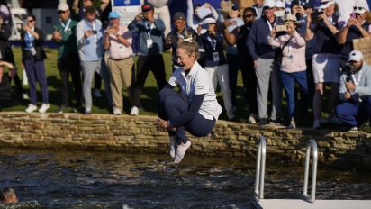 Associated Press - Nelly Korda jumps into the lake after winning the Chevron Championship LPGA golf tournament Sunday, April 21, 2024, at The Club at Carlton Woods in The Woodlands, Texas. (AP Photo/David J. Phillip)