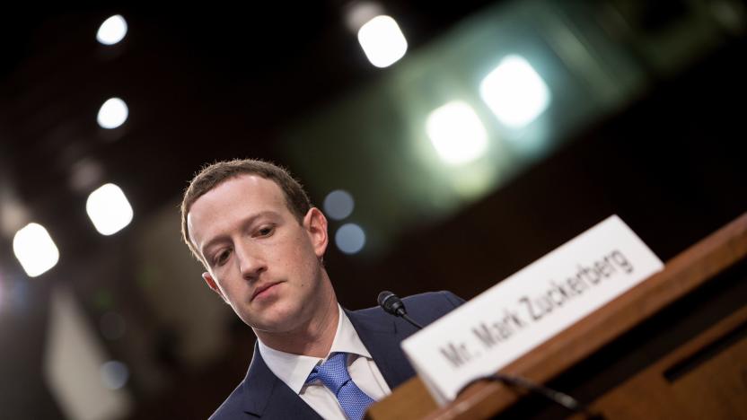 Facebook CEO Mark Zuckerberg listens during a joint hearing of the Senate Commerce, Science and Transportation Committee and Senate Judiciary Committee on Capitol Hill April 10, 2018 in Washington, DC.
Facebook chief Mark Zuckerberg took personal responsibility Tuesday for the leak of data on tens of millions of its users, while warning of an "arms race" against Russian disinformation during a high stakes face-to-face with US lawmakers. / AFP PHOTO / Brendan Smialowski        (Photo credit should read BRENDAN SMIALOWSKI/AFP via Getty Images)