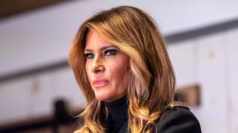 Melania Trump Goes Elegant in Blue Midi Dress & Pointy Tan Pumps for Thanksgiving Charity Event