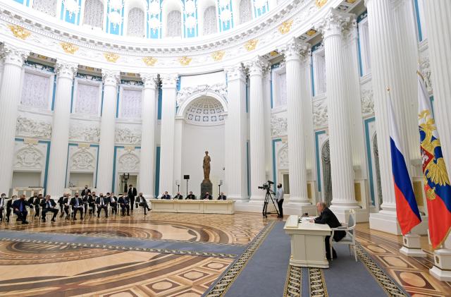 Russian President Vladimir Putin attends a meeting with representatives of the business community at the Kremlin in Moscow, Russia February 24, 2022. Sputnik/Aleksey Nikolskyi/Kremlin via REUTERS ATTENTION EDITORS - THIS IMAGE WAS PROVIDED BY A THIRD PARTY.