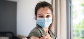 Woman receiving a COVID shot. (Getty Images)