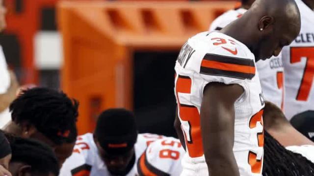 Large group of Browns players take a knee during national anthem