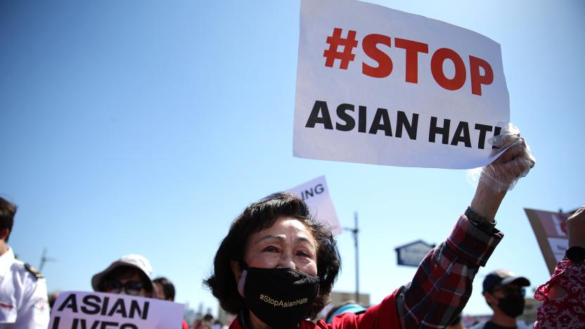 LOS ANGELES, CALIFORNIA - MARCH 27: People demonstrate at the 'Stop Asian Hate March and Rally' in Koreatown on March 27, 2021 in Los Angeles, California. March 27 is the #StopAsianHate  National Day of Action against anti-Asian violence. On March 16th, eight people were killed at three Atlanta-area spas, six of whom were Asian women, in an attack that sent fear through the Asian community amid a rise in anti-Asian hate crimes. (Photo by Mario Tama/Getty Images)