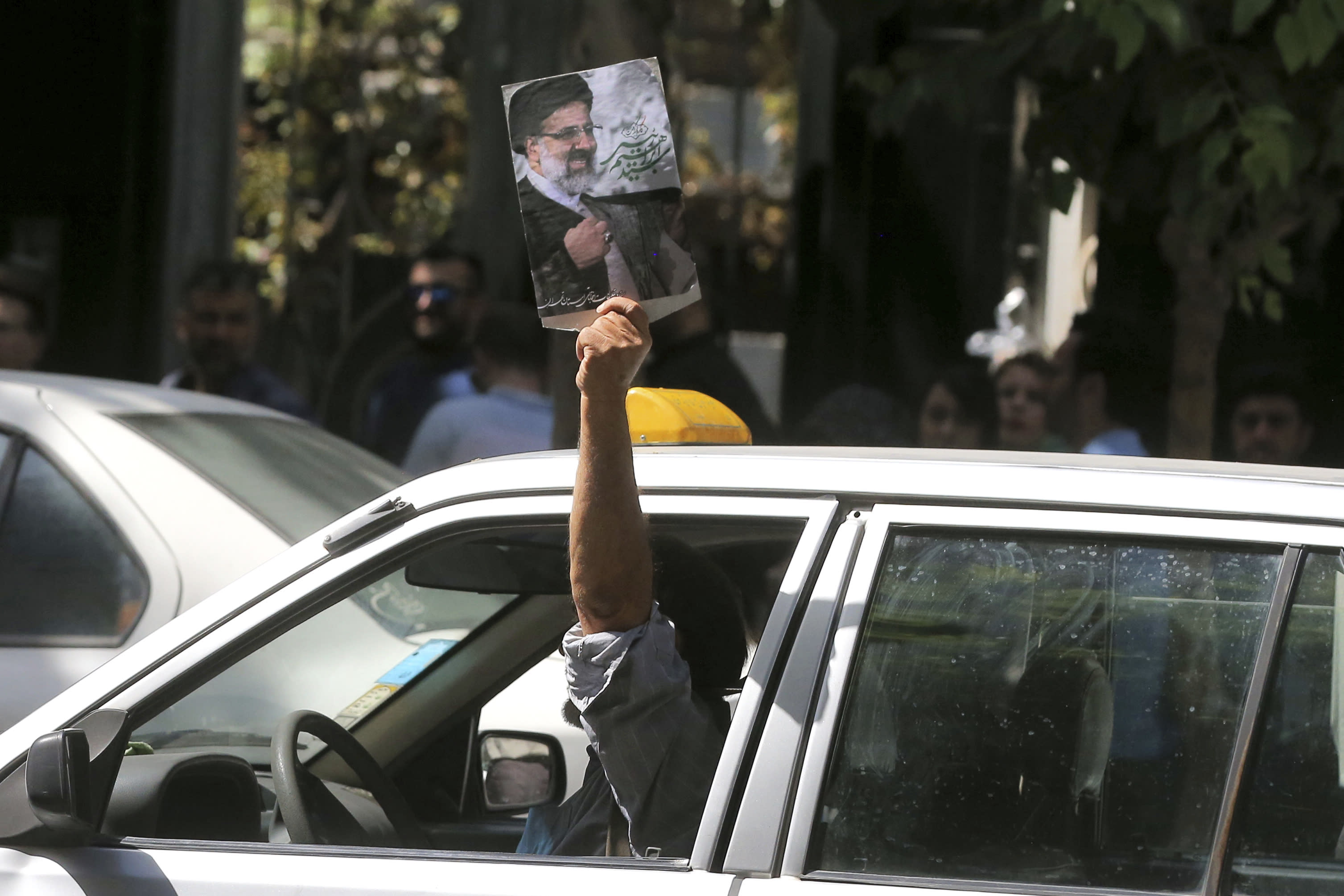 The Latest: Celebrations across Tehran after Rouhani win