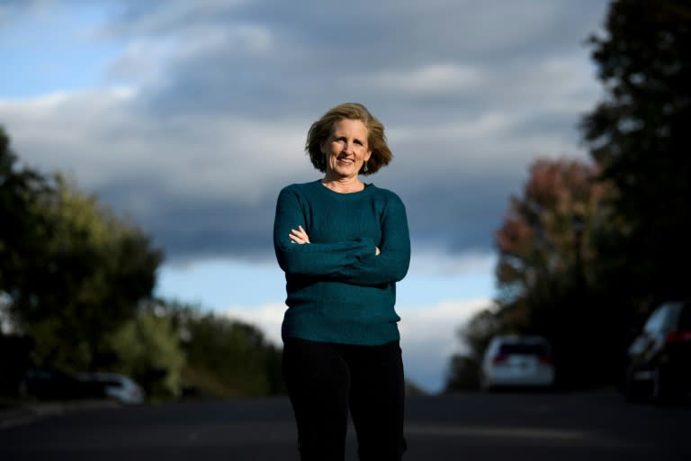 Juli Briskman was fired after a snapshot of her flipping the bird to the presidential motorcade went viral in 2017 (AFP Photo/Brendan Smialowski)