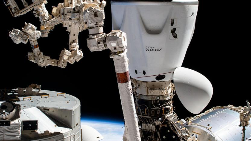 The SpaceX Dragon Endeavour crew ship is pictured docked to the Harmony module's space-facing international docking adapter. 