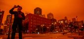 Smoke from Northern California wildfires casts a reddish aura in San Francisco in September 2020. (Ray Chavez/Getty Images)