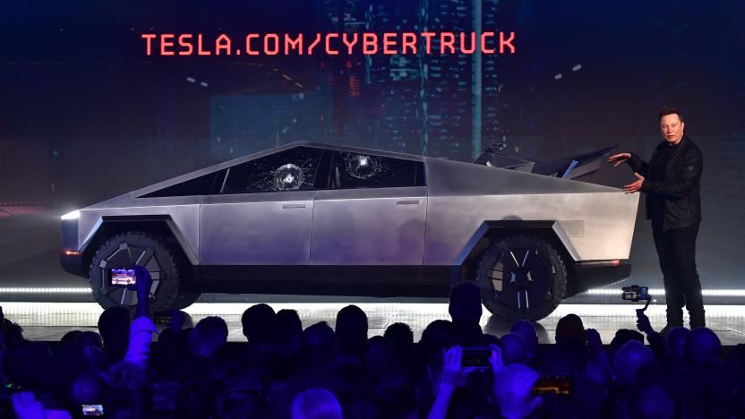 Tesla co-founder and CEO Elon Musk gestures while wrapping up his presentation of the newly unveiled all-electric battery-powered Tesla Cybertruck at Tesla Design Center in Hawthorne, California on November 21, 2019. (Photo by Frederic J. BROWN / AFP) (Photo by FREDERIC J. BROWN/AFP via Getty Images)