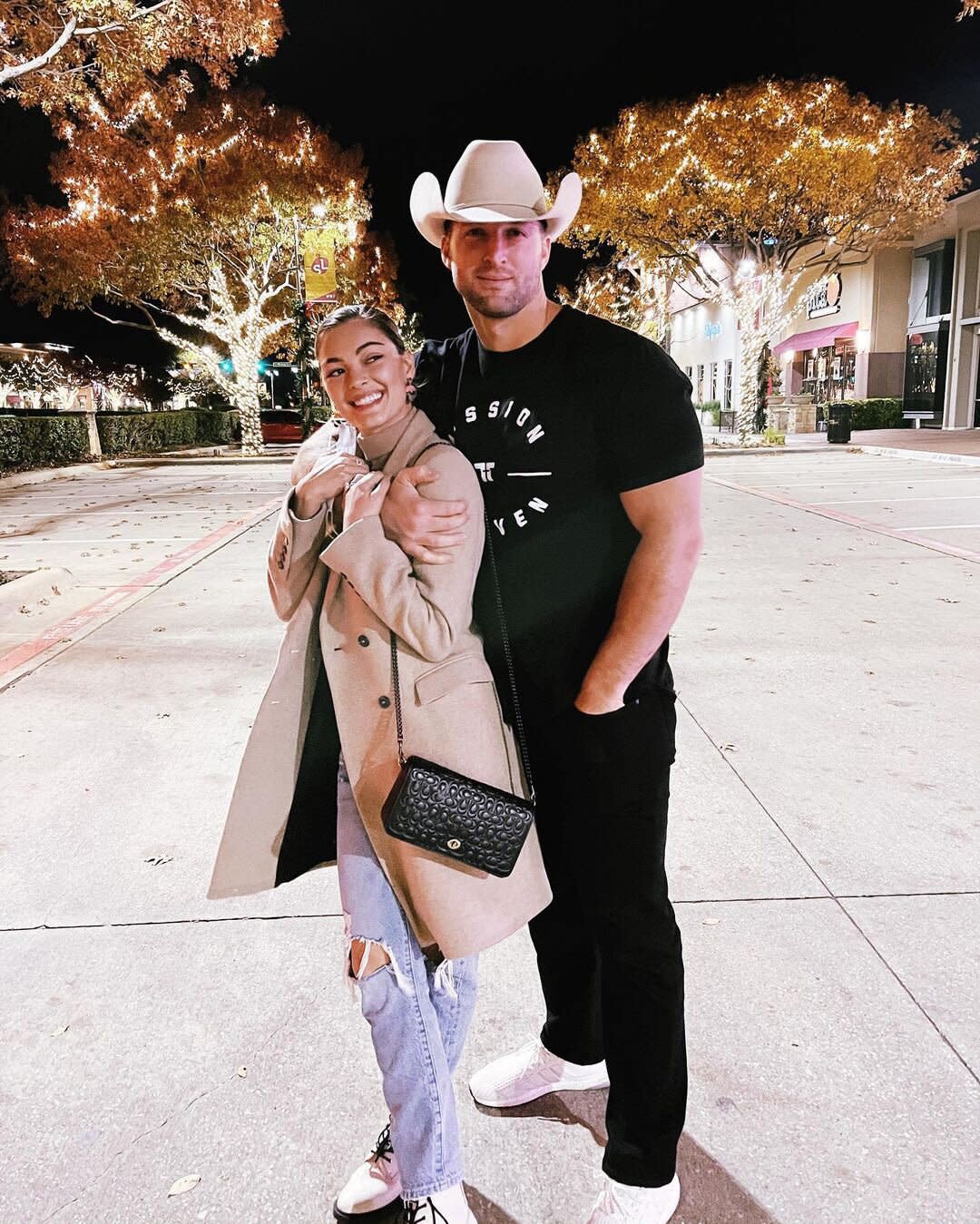 Tim Tebow Wears a Cowboy Hat While Cozying Up to Wife Demi ...