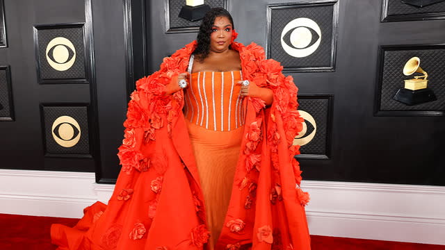 Lizzo arrives at Grammy's in Dolce and Gabbana gown