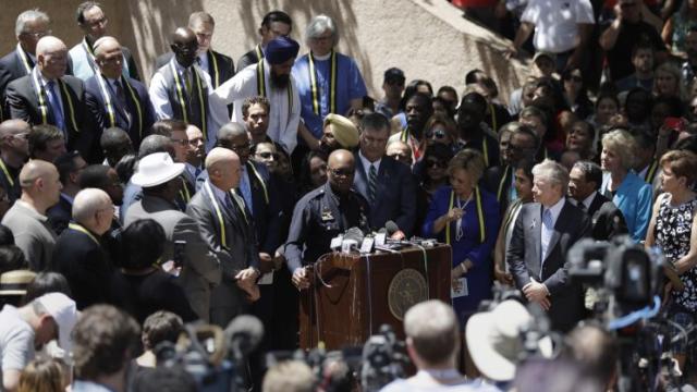 David Brown takes part in a prayer vigil at Thanksgiving Square, Friday, July 8, 2016, in Dallas. (Photo: Eric Gay/AP)