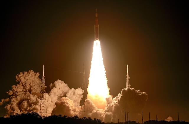 NASA's new moon rocket lifts off from Launch Pad 39B at the Kennedy Space Center in Cape Canaveral, Fla., Wednesday, Nov. 16, 2022. This launch is the first flight test of the Artemis program. (AP Photo/John Raoux)