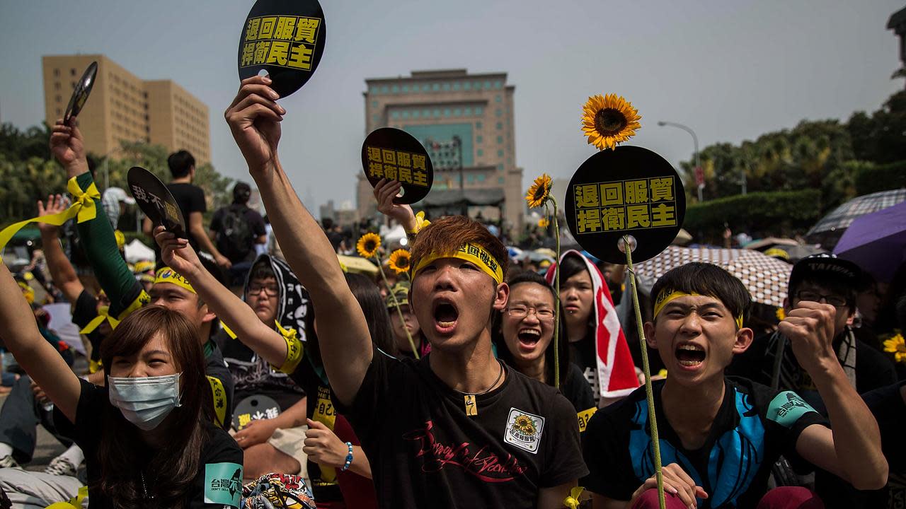 Thousands in Taiwan protest China trade deal