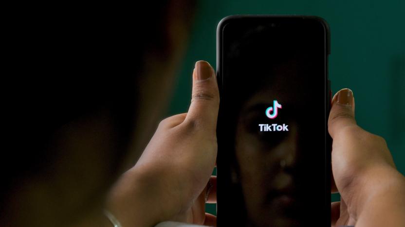 An Indian mobile user browses through the Chinese owned video-sharing 'Tik Tok' app on a smartphone in Bangalore on June 30, 2020. - TikTok on June 30 denied sharing information on Indian users with the Chinese government, after New Delhi banned the wildly popular app citing national security and privacy concerns.
"TikTok continues to comply with all data privacy and security requirements under Indian law and have not shared any information of our users in India with any foreign government, including the Chinese Government," said the company, which is owned by China's ByteDance. (Photo by Manjunath Kiran / AFP) (Photo by MANJUNATH KIRAN/AFP via Getty Images)