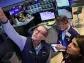 Stocks close mixed as Fed holds interest rates steady