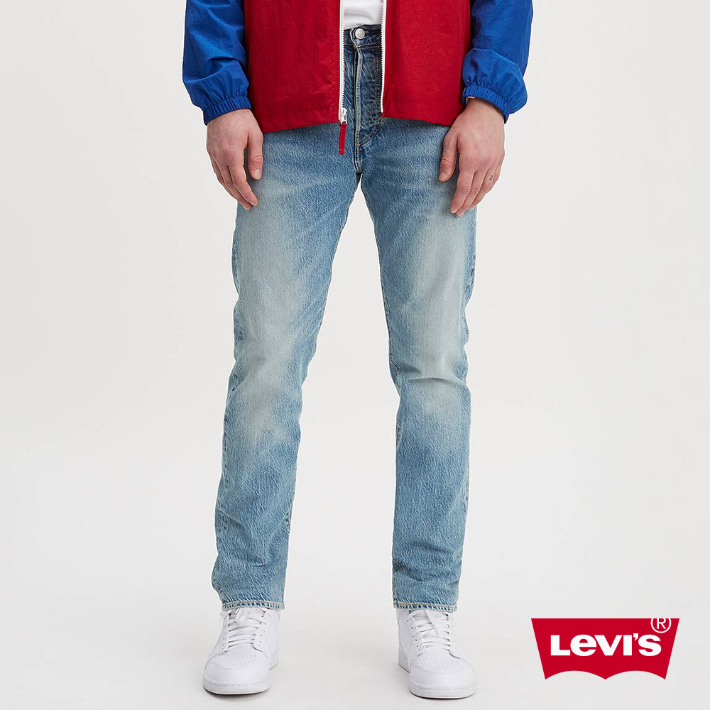 Levis 上寬下窄 Taper 排扣牛仔長褲 淺藍水洗