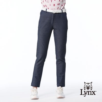 【Lynx Golf】女款日本進口布料彈性舒適百搭牛仔紋路脇邊剪裁造型窄管長褲-牛仔藍色