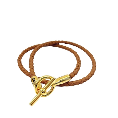 HERMES 愛馬仕 經典編織雙圈T扣手環(駝/金)