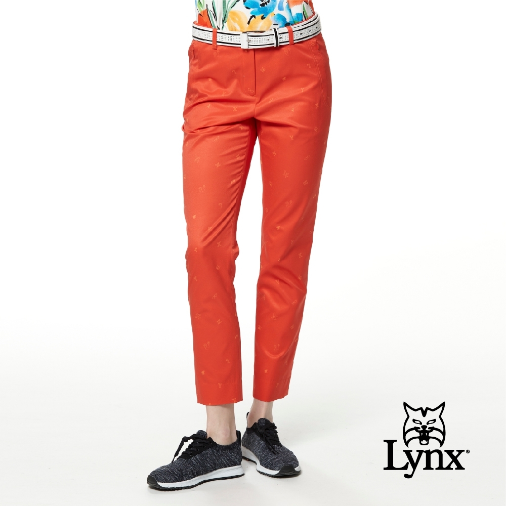 【Lynx Golf】女款吸濕排汗俏皮印花隱形拉鍊口袋窄管九分褲-橘色