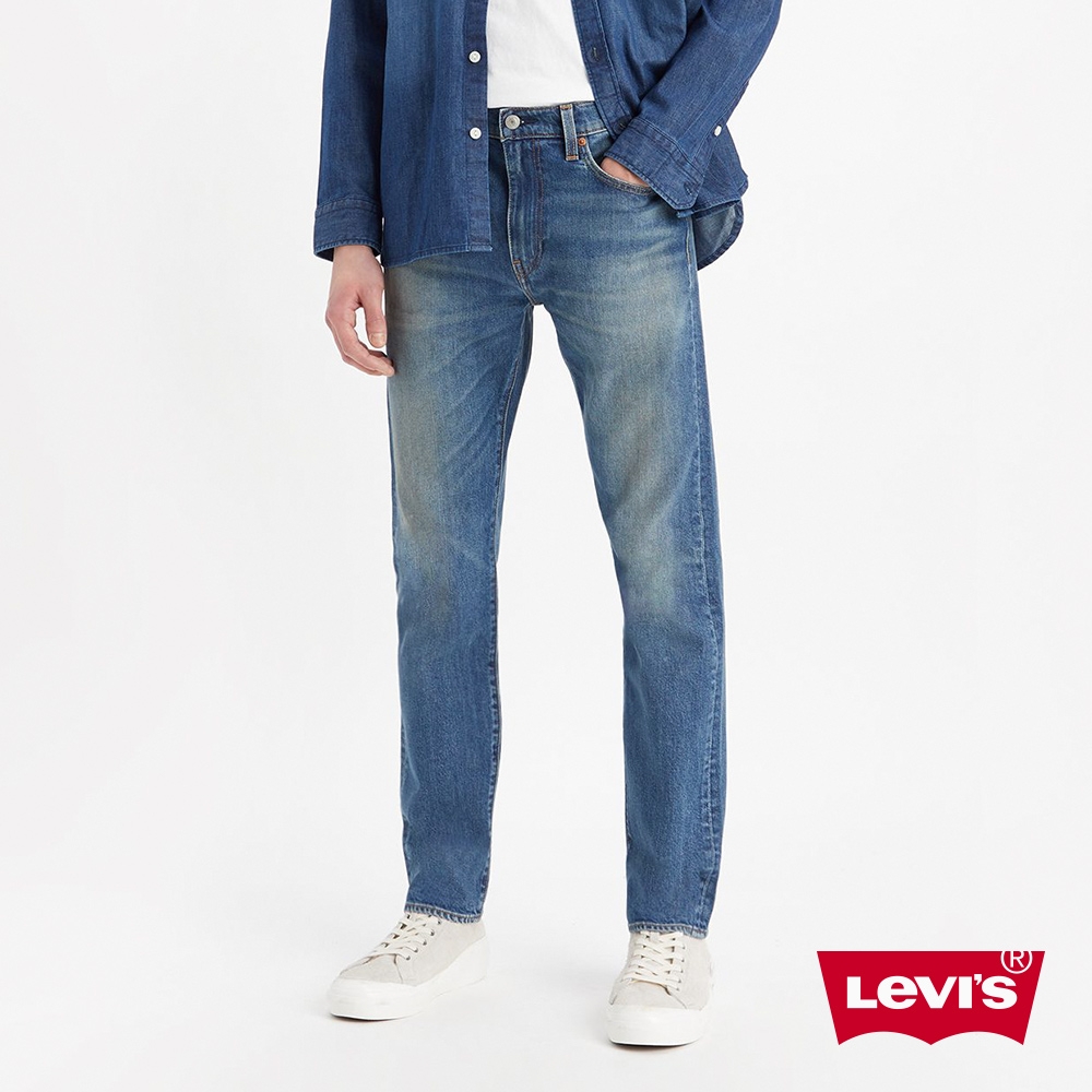 Levis 男款 上寬下窄 502舒適窄管牛仔褲 / 精工中藍染洗舊 / 天絲棉 / 彈性布料