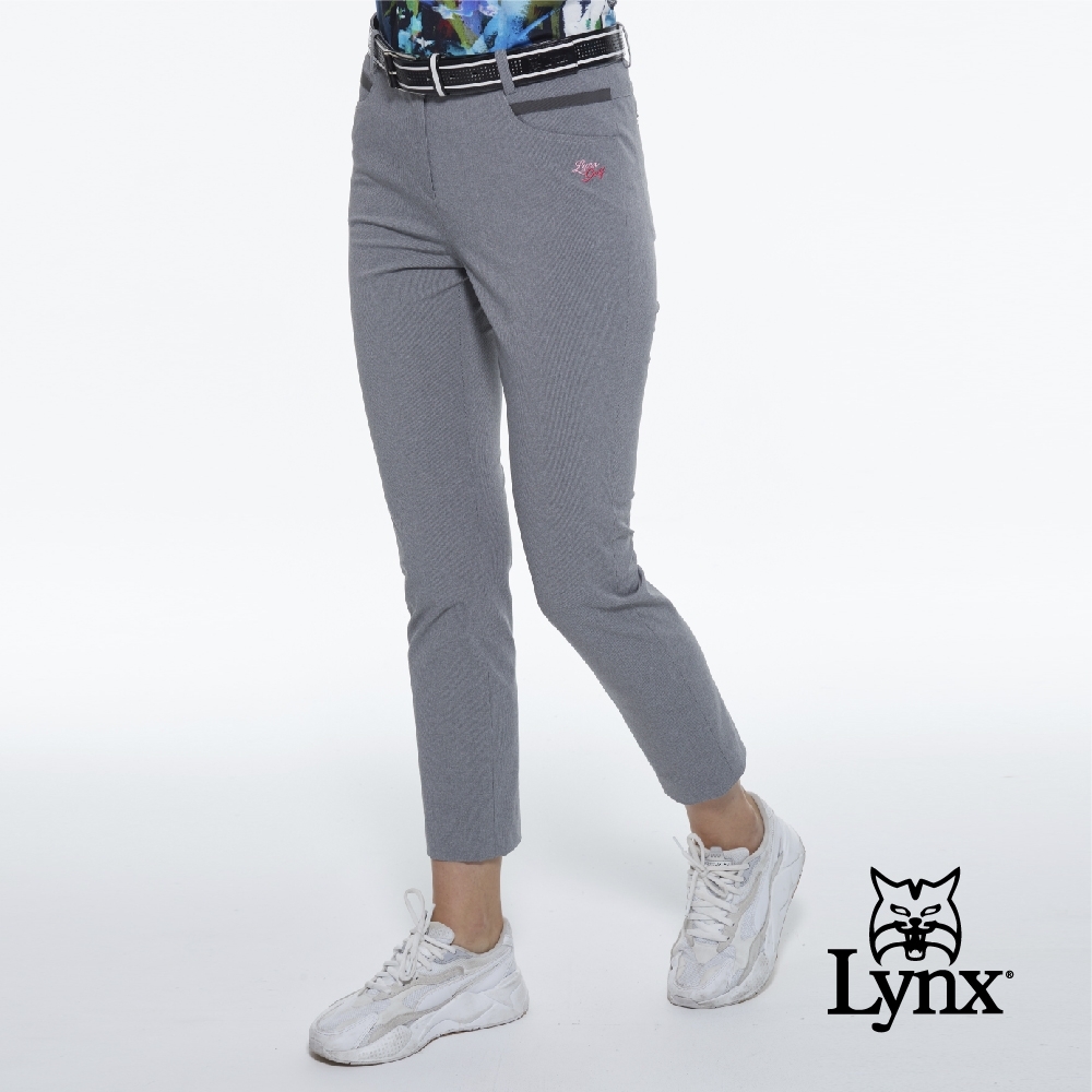 【Lynx Golf】女款素面經典款Lynx繡花迴紋帶設計窄管休閒九分褲-黑色