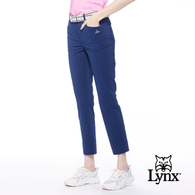 【Lynx Golf】女款日本進口布料彈性經典格紋口袋出芽設計窄管九分褲-深藍色