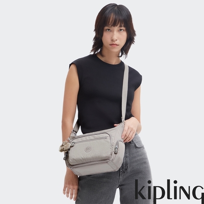『牛角包』Kipling 溫柔沉穩灰多袋實用側背包-GABBIE S