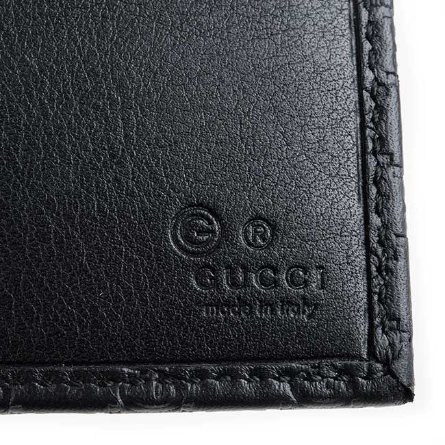 GUCCI經典Guccissima系列雙G壓紋LOGO皮革扣式長夾(黑色)