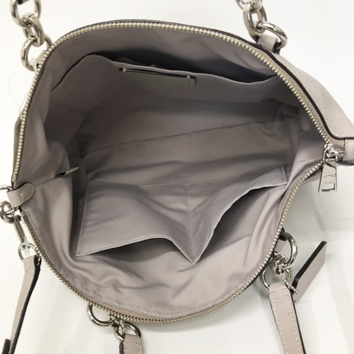 COACH 金屬馬車LOGO全牛皮手提斜背包兩用包/水餃包-中款(冷蕎麥)