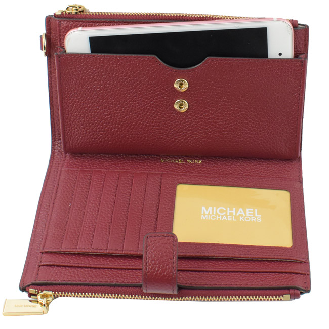 MICHAEL KORS WRISTLETS牛皮對開式雙拉鍊手掛中夾(紫紅)