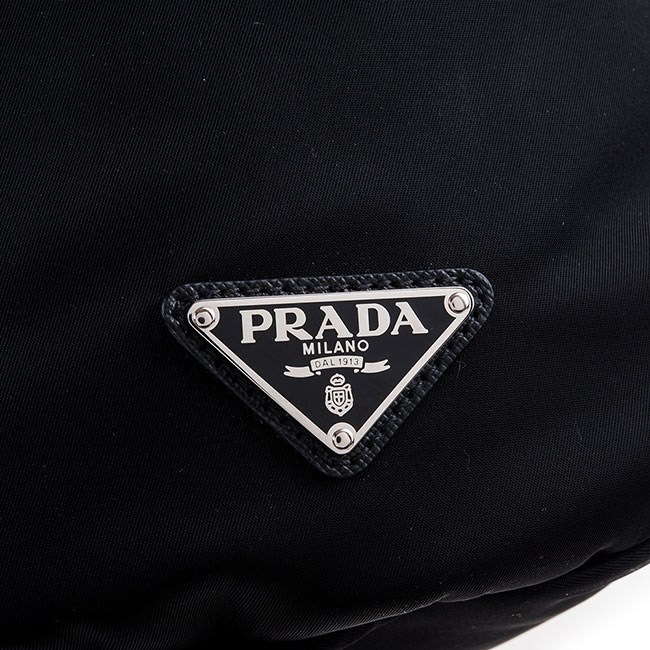 PRADA 經典尼龍帆布束口雙釦大口袋翻蓋後背包 (黑色)