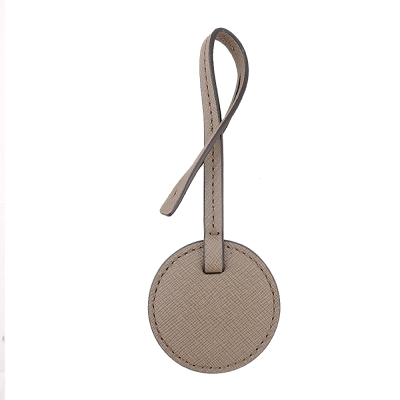 MICHAEL KORS LOGO刻字圓型防刮皮革吊飾(淺駝)